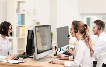 Technical support agents working in office