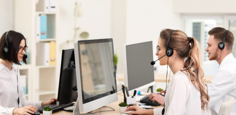 Technical support agents working in office